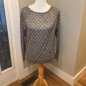 Gray long sleeve shirt with white polkadots.